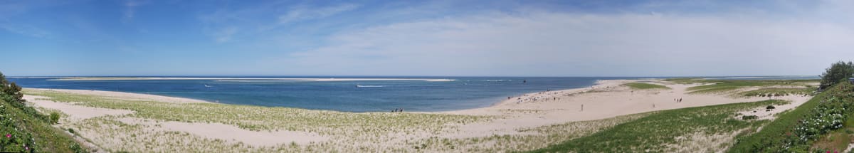 Wide sandy Cape Cod beach panorama - the peninsula offers both calm Sound beaches and dramatic Bay shores