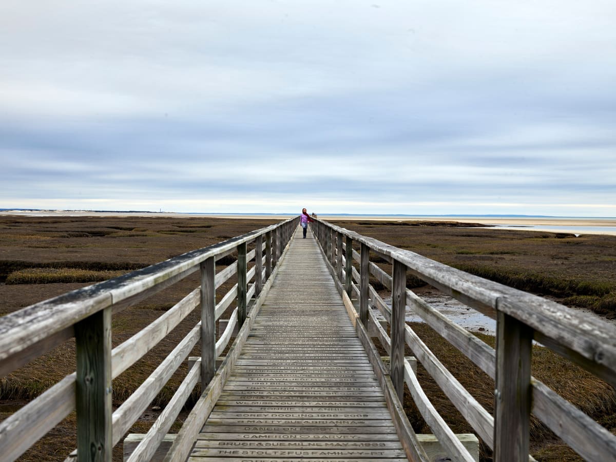 Bass Hole Boardwalk at Gray's Beach in Yarmouth Port - a wooden walkway over Cape Cod salt marsh leading to tidal flats