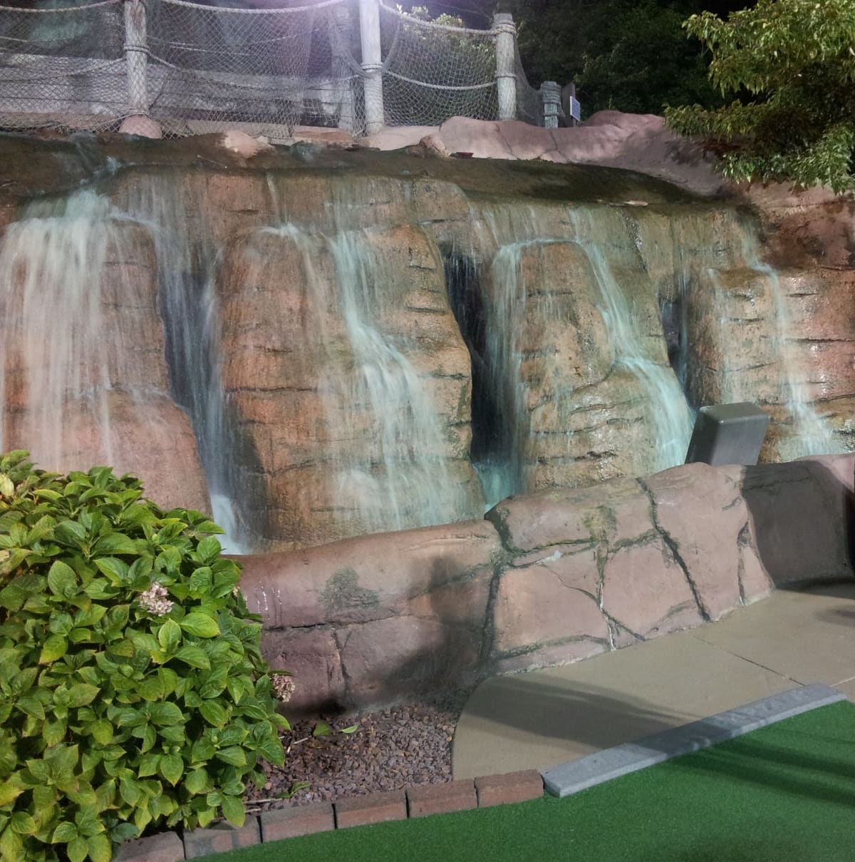 Waterfall feature at Pirate's Cove Adventure Golf in South Yarmouth - two 18-hole courses 3 miles from Relax Inn on Route 28