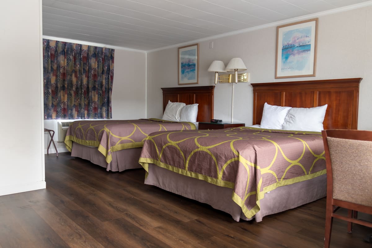 Comfortable Relax Inn room with mini-fridge and microwave - save money by keeping snacks and drinks in-room