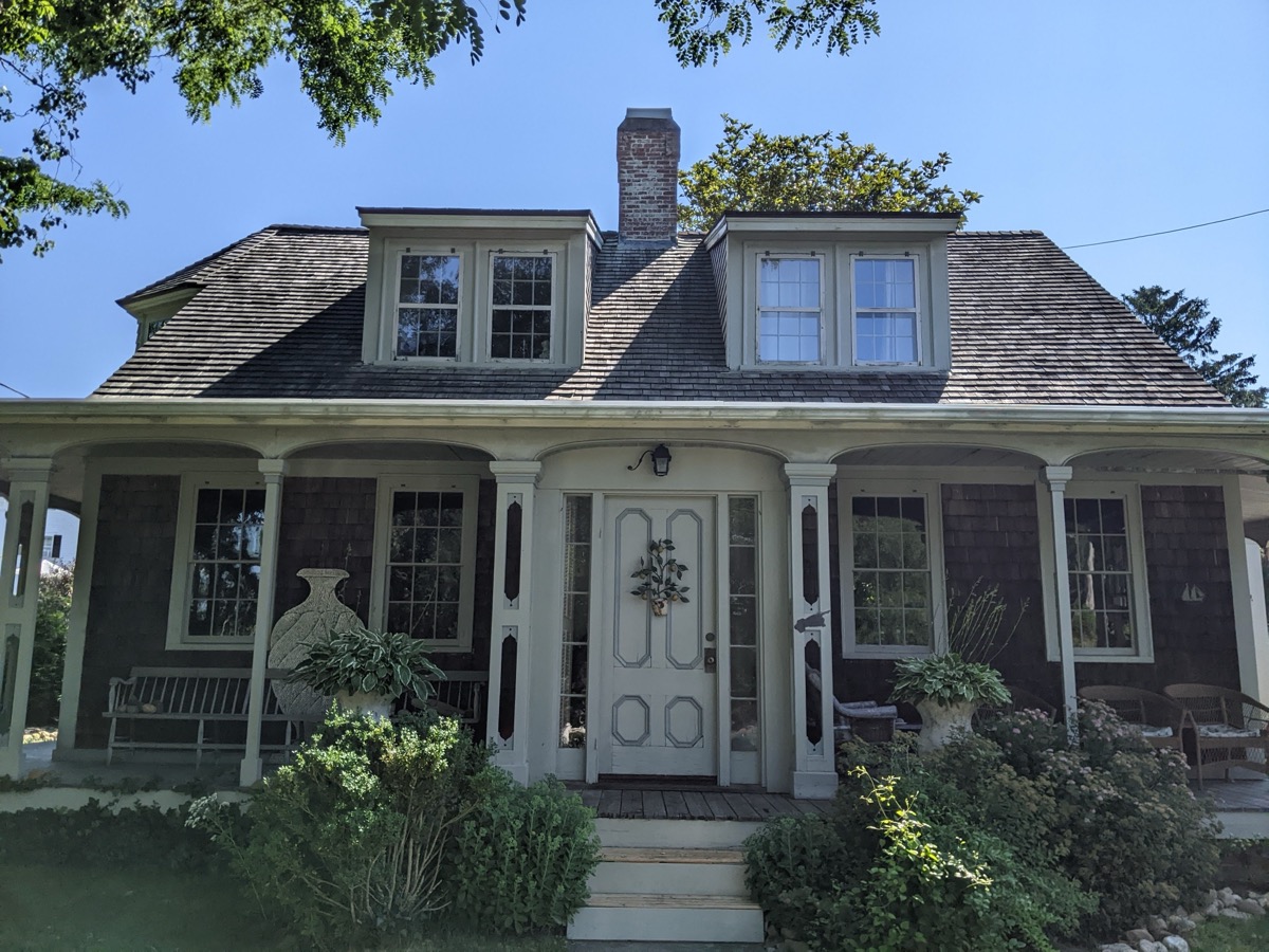 Edward Gorey House exterior at 8 Strawberry Lane in Yarmouth Port - shingle-style Cape Cod home with front porch