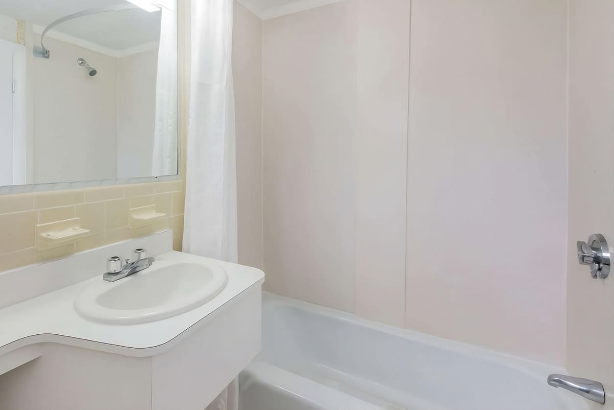 Deluxe room bathroom at Relax Inn Cape Cod